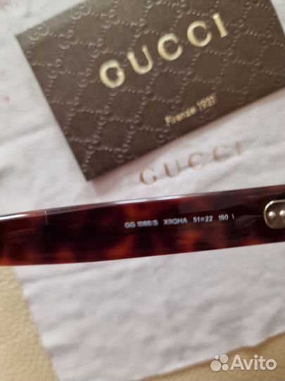 Солнцезащитные очки Gucci