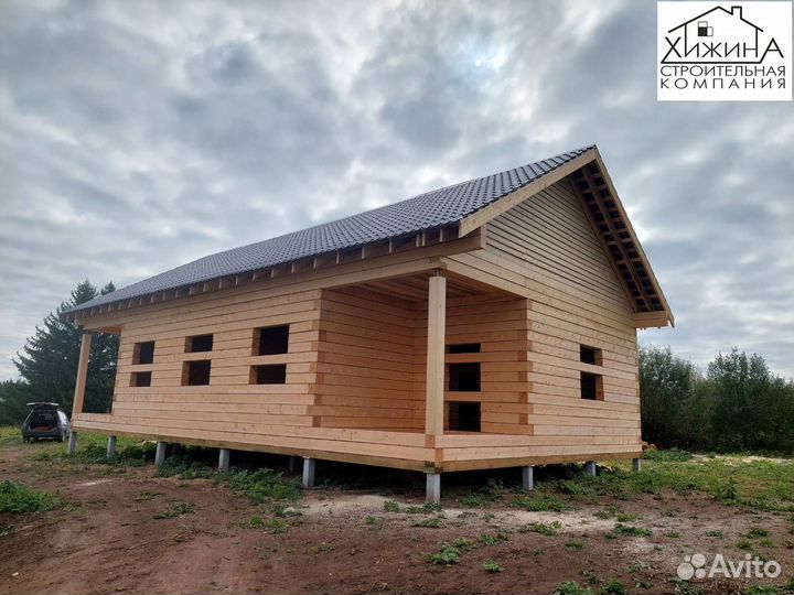 Срубы дома из бруса 9х9 с террасой строительство