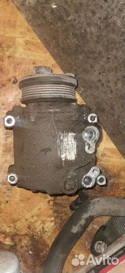 Компрессор кондиционера Mitsubishi Lancer 9