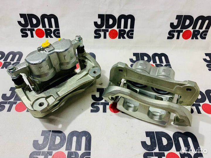 Комплект передних суппортов Camry, Rav4, Alphard