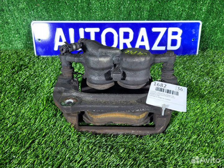 Суппорт тормозной передний левый Citroen C4