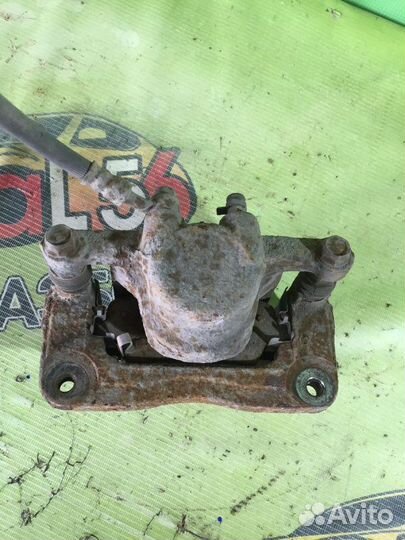 Суппорт тормозной задний левый Hyundai Santa Fe CM