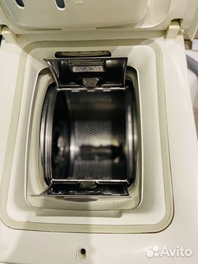 Стиральная машинка с вертикальной загрузкой