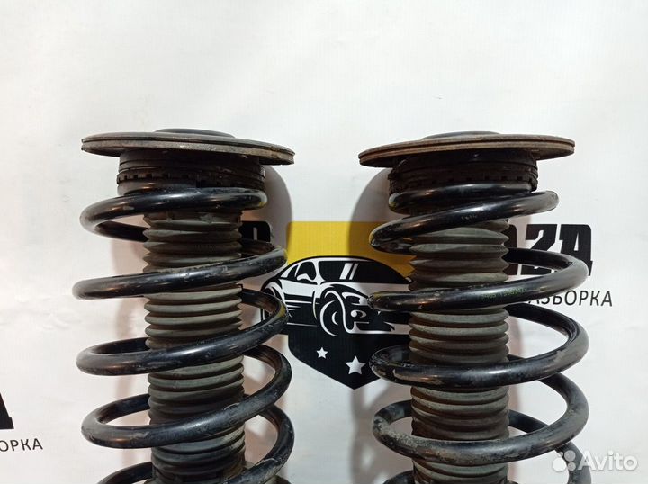 Стойки амортизаторов передние (комплект)