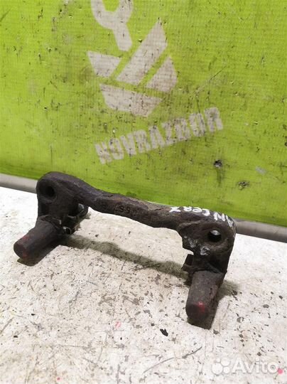 Скоба суппорта заднего Митсубиси Лансер 10