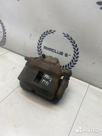 Суппорт передний правый Nissan Primera P11 1.6