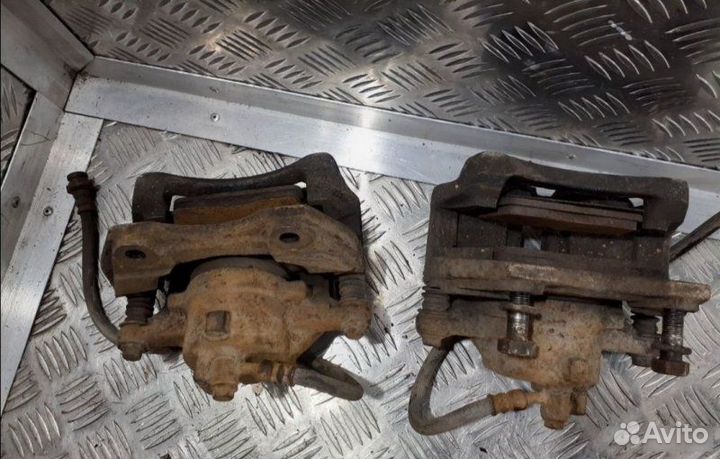 Суппорт передний Nissan Almera N16 QG15