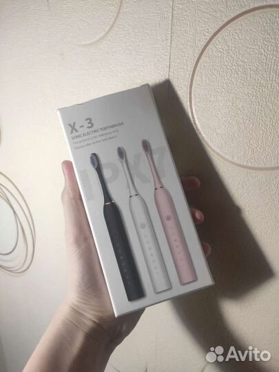 Электрическая зубная щётка