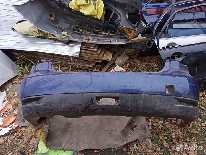 Задний бампер Nissan Almera G15