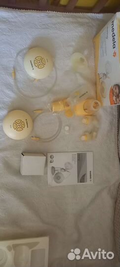 Молокоотсос medela swing электрический