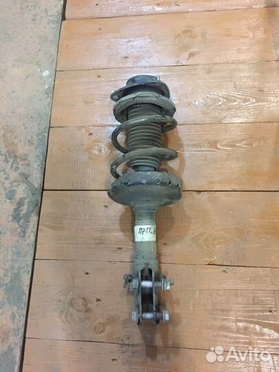 Субару форестер стойка передняя