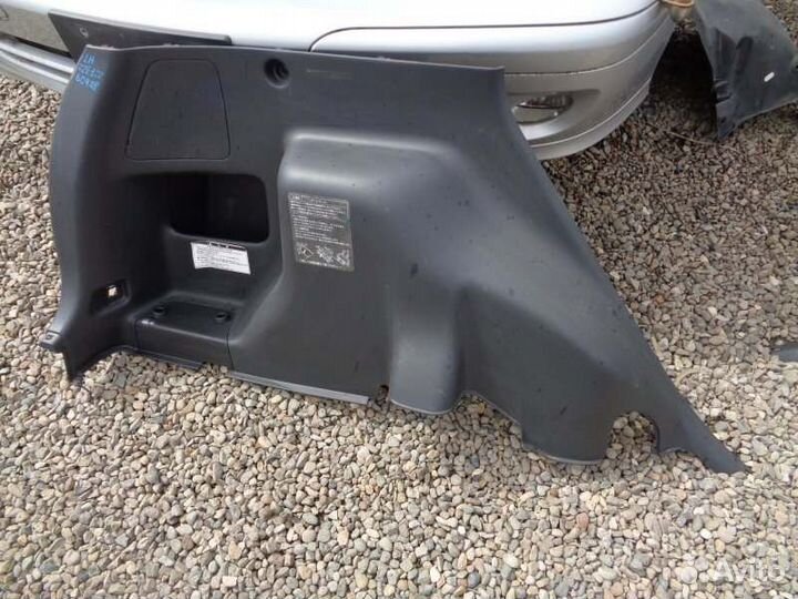 Обшивка багажника левая Toyota Corolla Spacio