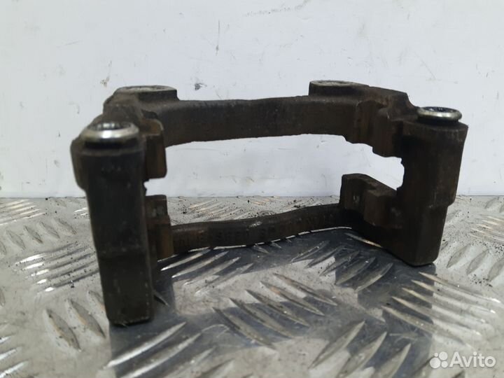 Б/У Скоба суппорта заднего LR Opel Astra Famil