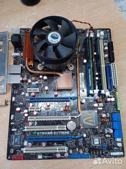 Asus p5n32-e sli plus + C2D e7400 + FAN + RAM 3Gb