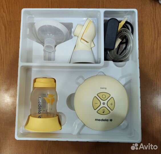 Молокоотсос medela электрический