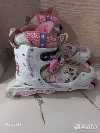 Роликовые коньки