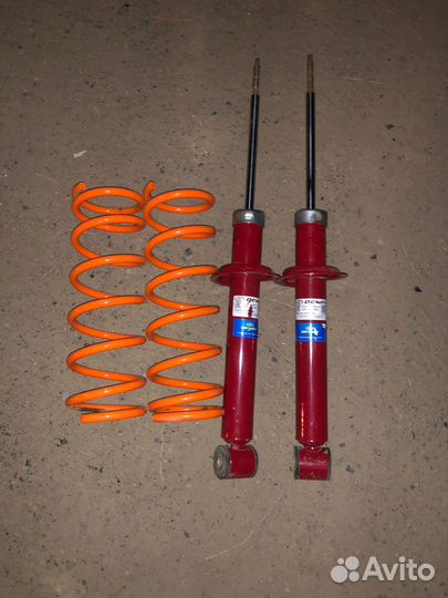 Стойки с пружинами