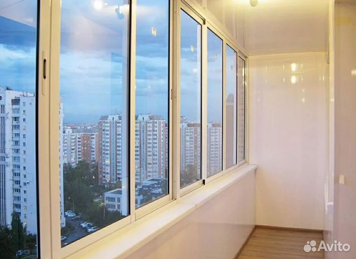 Остекление балкона с обшивкой