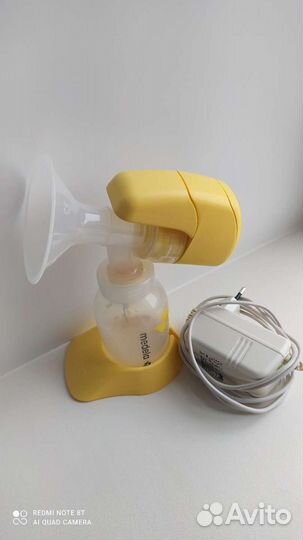 Молокоотсос medela электрический