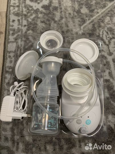 Молокоотсос электрический новый