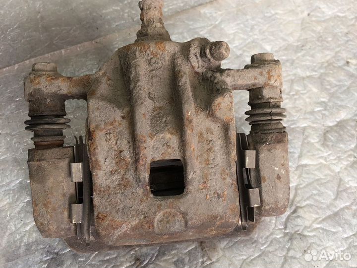 Суппорт тормозной задний Hyundai Sonata 5 EF тагаз