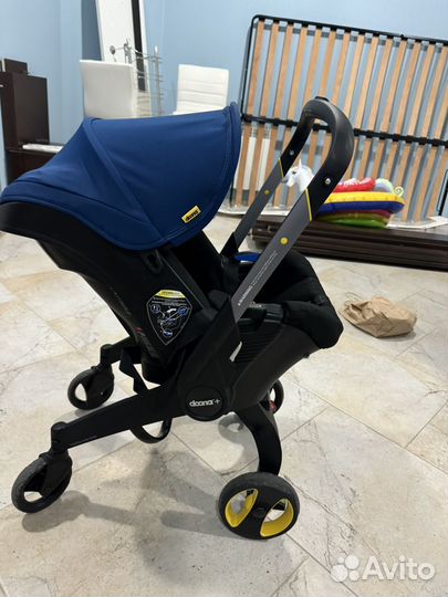 Коляска автокресло doona