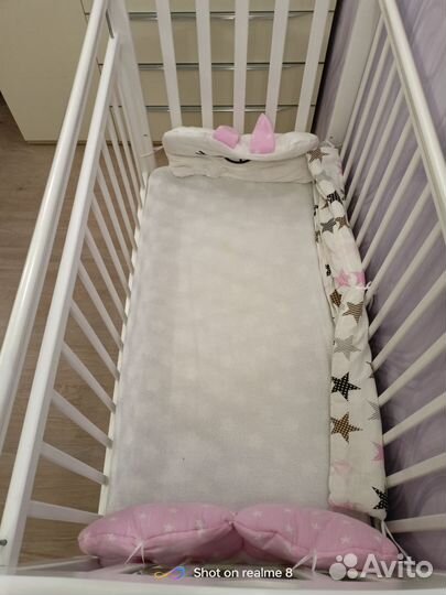 Детская кроватка с маятником