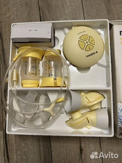 Молокоотсос medela swing maxi flex