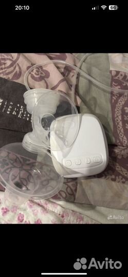 Молокоотсос электрический новый