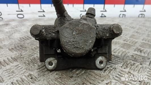 Суппорт тормозной задний правый toyota avensis T25