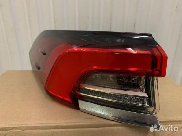 Фонарь задний левый Toyota Corolla E210