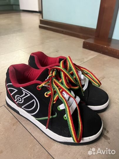 Кроссовки на роликах heelys