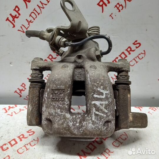 Суппорт тормозной задний правый Volkswagen Touran