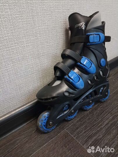 Роликовые коньки