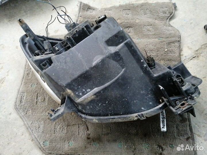 Фара передняя левая Mazda Demio DY