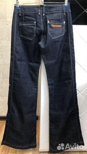 Джинсы клеш от бедра 42-44
