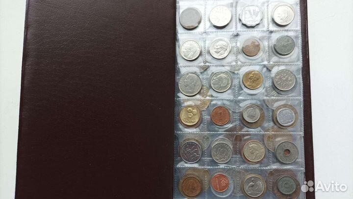 Коллекция иностранных монет в альбоме