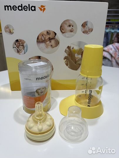 Молокоотсос medela электрический