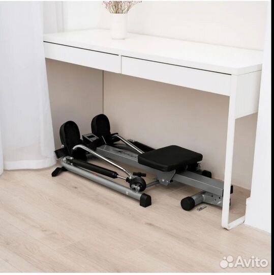 Гребной тренажер