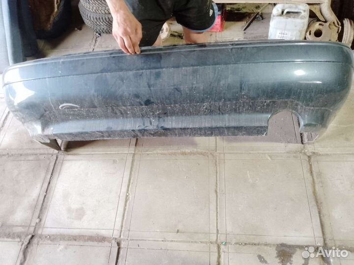 Бампер задний Toyota Carina E Тойота Карина Е