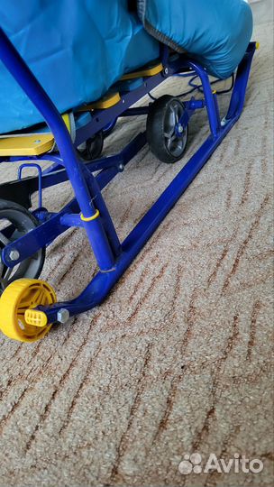 Коляска санки на колесах