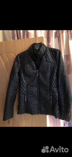 Куртки новые