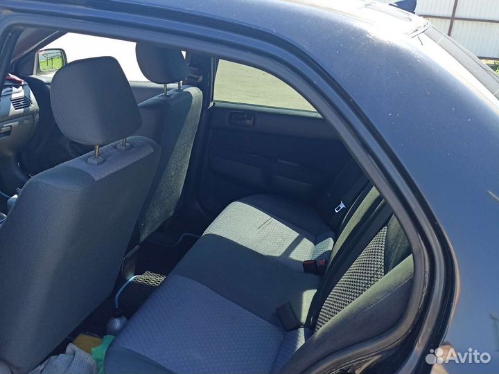 Mitsubishi Lancer Cedia 1.8 МТ, 2002, 100 000 км