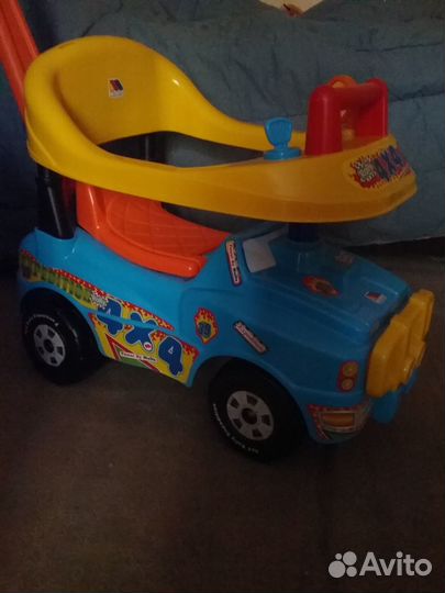 Машина-каталка новая