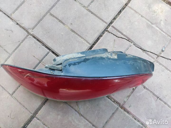 Фонарь левый Mitsubishi Colt CA 4 поколение 92-96