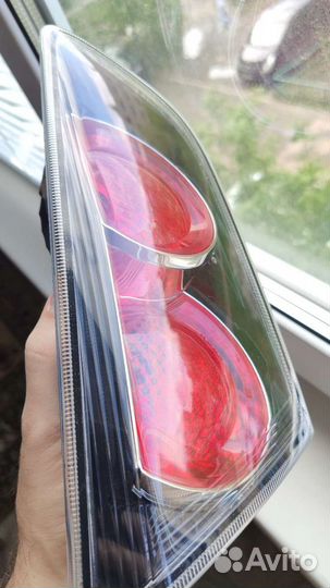 Фонарь задний левый Mitsubishi Lancer 10 оригинал