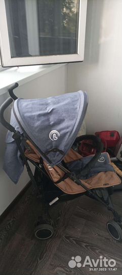 Прогулочная коляска трость