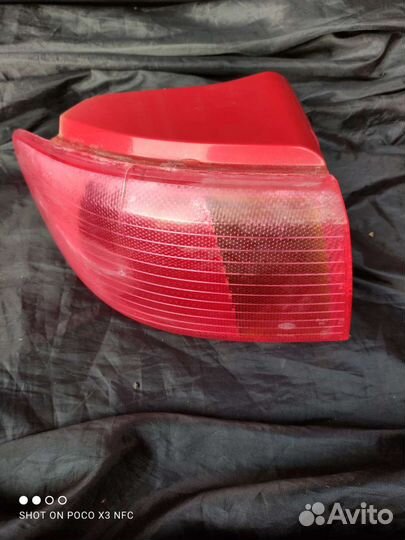 Фара задняя левая на мазду 2