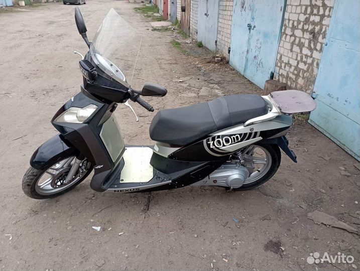 Скутер Nexus Zoom