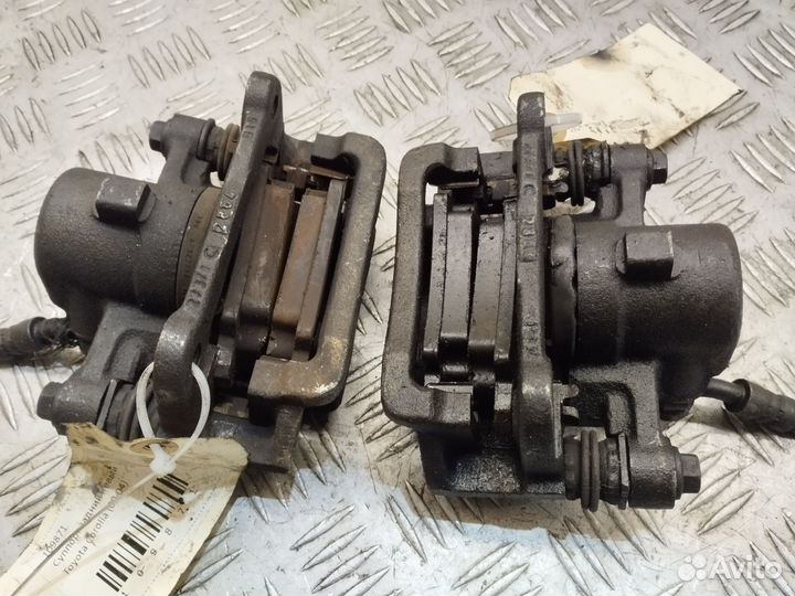 Суппорт задний Toyota Corolla 00-04